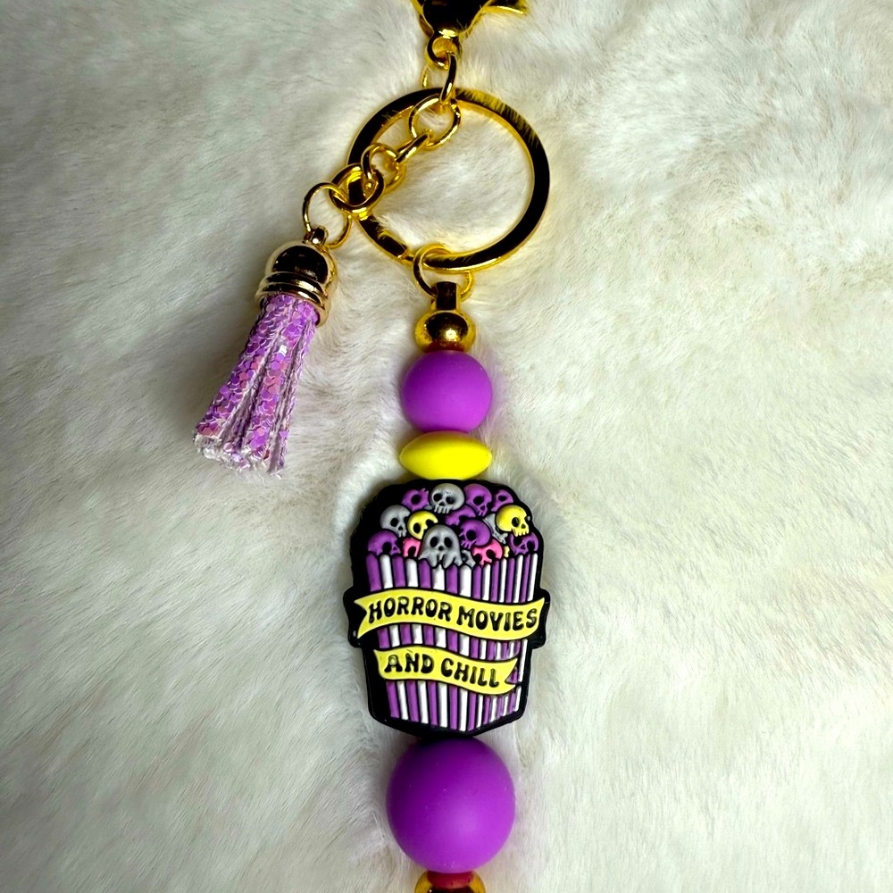 Purple and Gold Horror Movies Keychain
